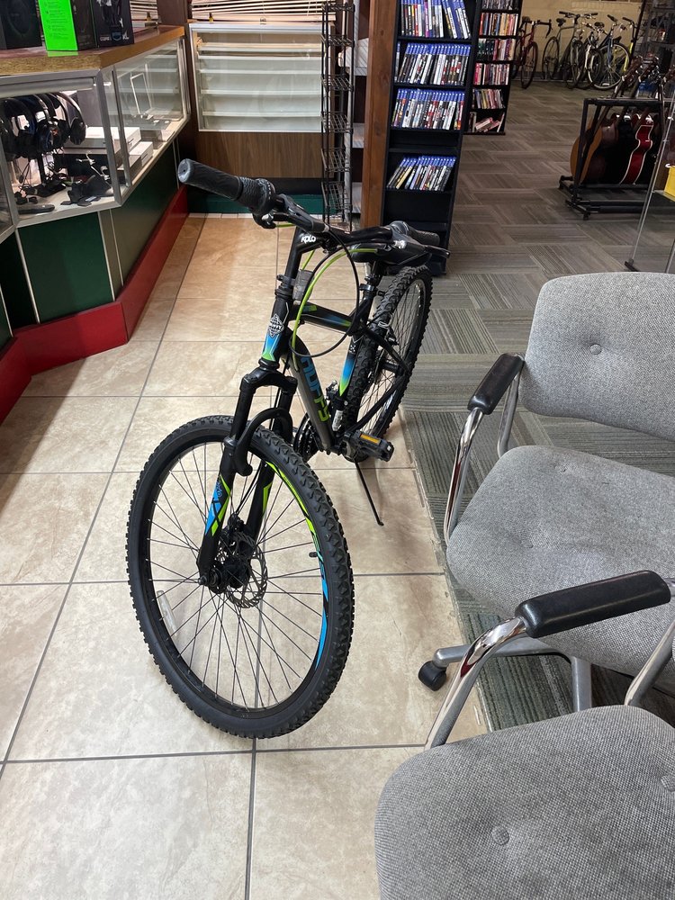 Bicycle and additional inventory on the sales floor at Golden Goat
